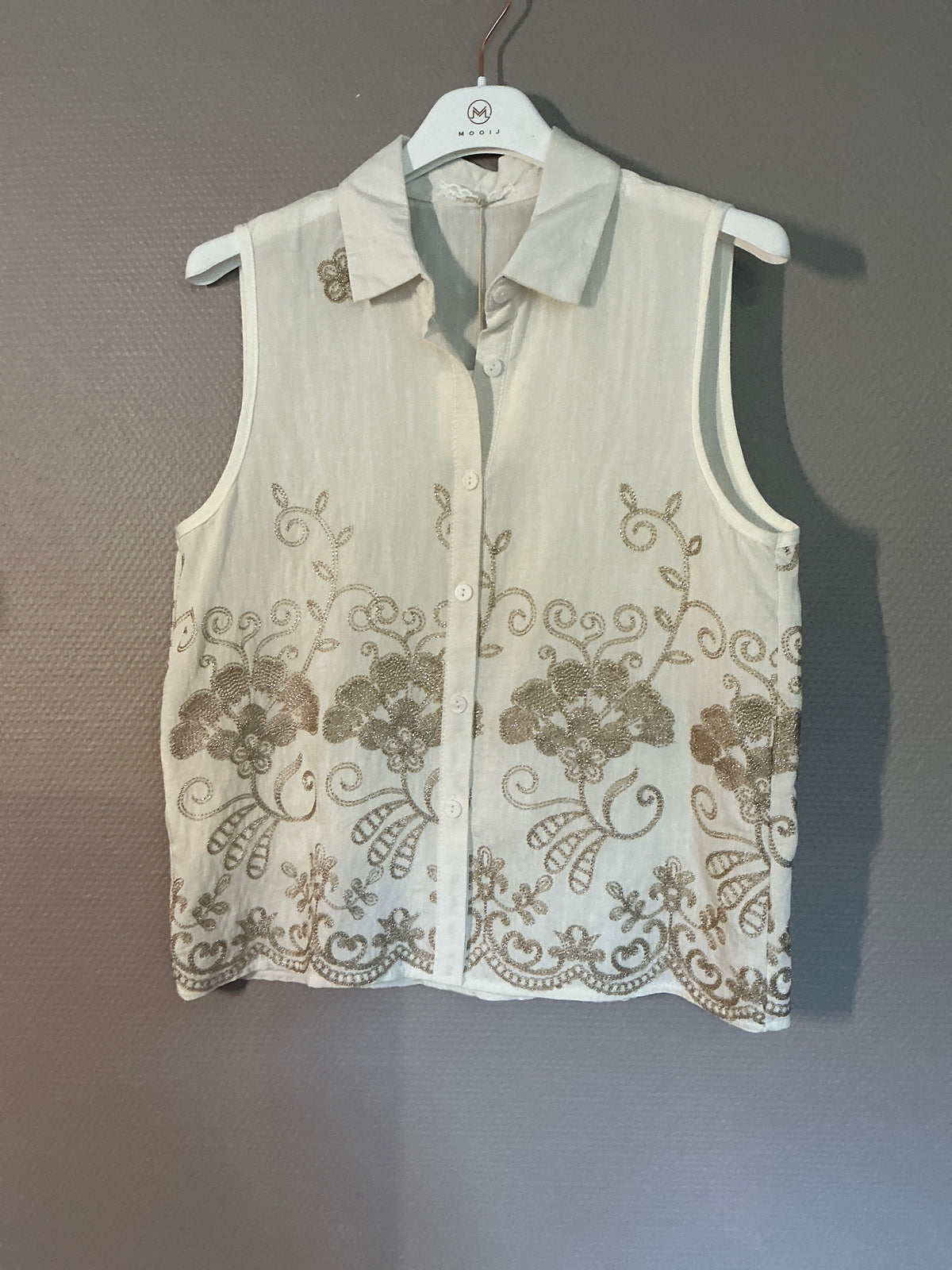 Elegante Bluse ohne Arm mit Stickerei Details
