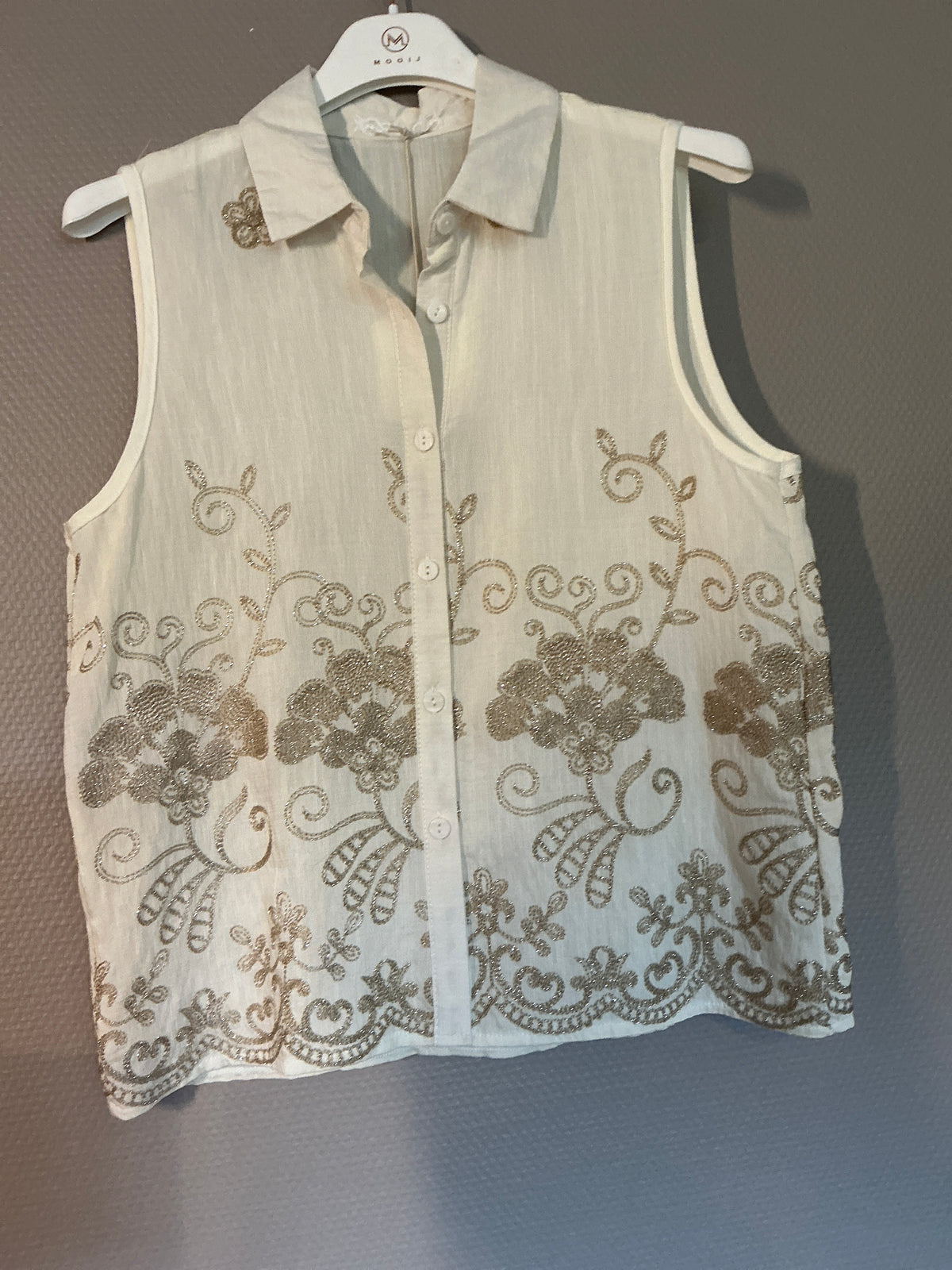 Elegante Bluse ohne Arm mit Stickerei Details